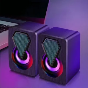 Caixa de som gamer para computador e notebook com iluminação LED e áudio potente, ideal para jogos, músicas e filmes com mais imersão.